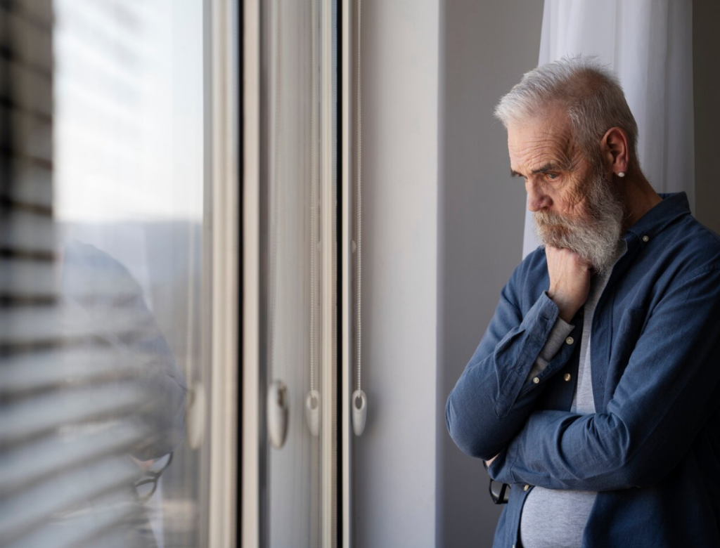Elderly-man-at-home-appearing-confused-and-distressed.webp