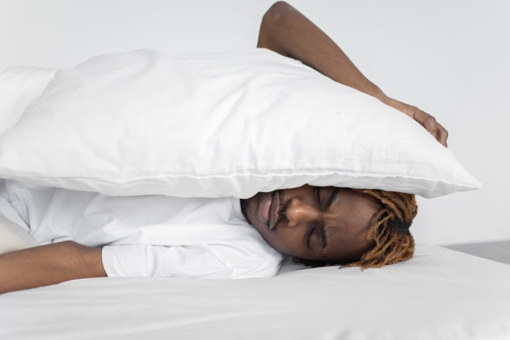 a-man-trying-to-sleep.webp